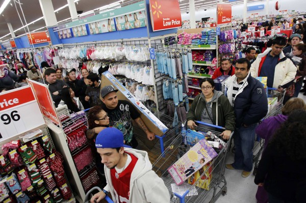 Shoppers line the aisles at WalMart on the Thanksgiving Day holiday in Salem