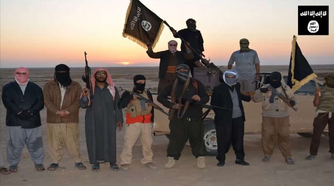 isis-militants-wave-a-flag-in-iraq