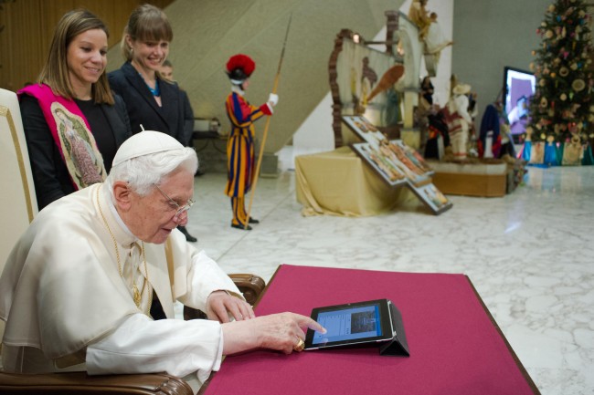 Pope Benedict XVI posts his first tweet using an iPad tablet after his Wednesday general audience in Paul VI's Hall at the Vatican