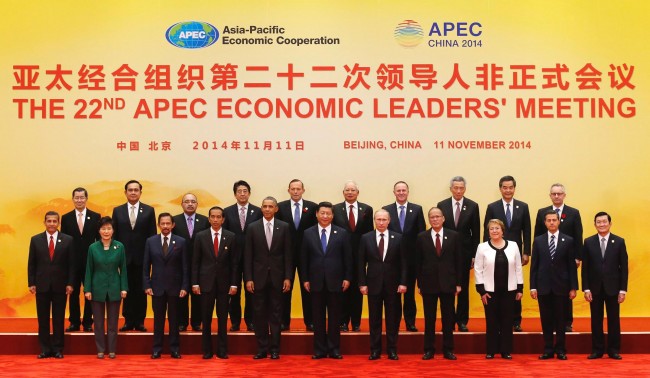 APEC leaders pose for a family photo at the International Convention Center at Yanqi Lake in Beijing