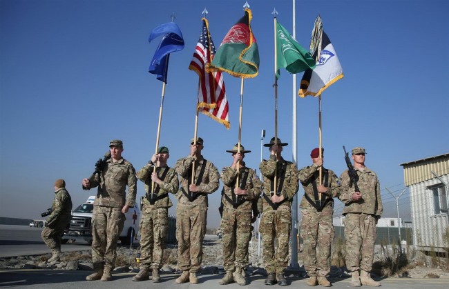 141208-afghanistan-nato-flag-down-war-end-01_resize