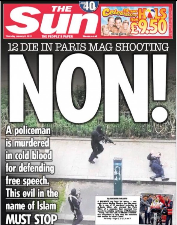 150107-newspaper Charlie Hebdo attacked-15