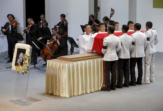 Pallbearers carry the coffin of Singapore's former leader Lee Kuan Yew during his funeral at the National University of Singapore