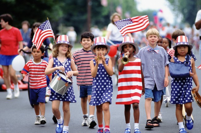 20 May 1999 --- Independence Day parade --- Image by © Ariel Skelley/CORBIS