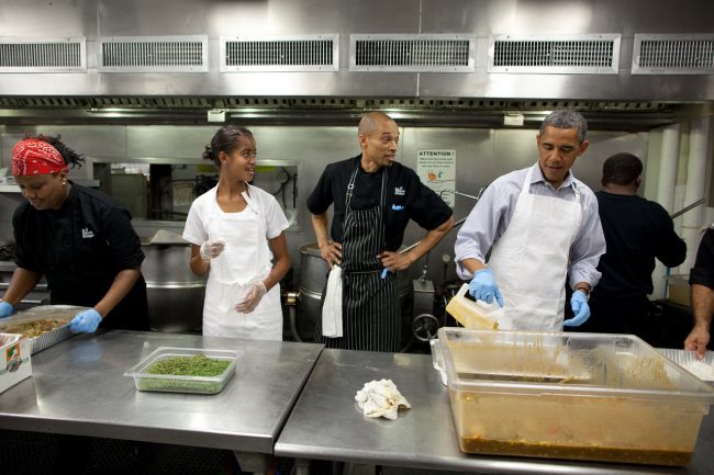 President Barack Obama and daughter Malia Obama participate in a service project to commemorate the September 11th National Day of Service and Remembrance at DC Central Kitchen near the U.S. Capitol in Washington, D.C., Sept. 10, 2011. (Official White House Photo by Pete Souza) This photograph is provided by THE WHITE HOUSE as a courtesy and may be printed by the subject(s) in the photograph for personal use only. The photograph may not be manipulated in any way and may not otherwise be reproduced, disseminated or broadcast, without the written permission of the White House Photo Office. This photograph may not be used in any commercial or political materials, advertisements, emails, products, promotions that in any way suggests approval or endorsement of the President, the First Family, or the White House.